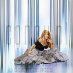 07-03-2000 Patricia Paay at studio in Amsterdam, by order of La Paay Cosmetics. March 07, 2000.

[keywords]Posed, Smiling[/keywords]